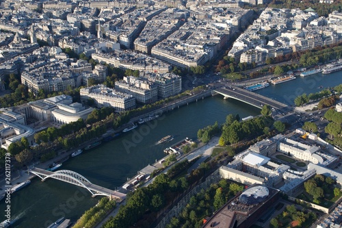 Looking down at River Seine (Paris, France) with bridges and boats
