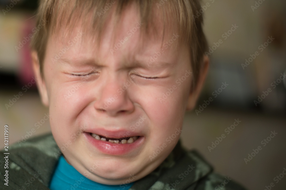 Little boy crying close up. Children's grief, sadness concept. Little boy crying close up. Children's grief, sadness concept.