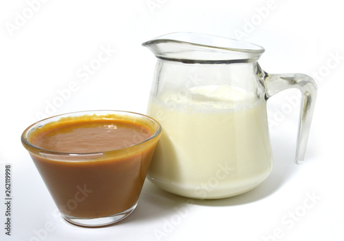 Milk sweet. Bowl of milk glass. Milk jug.