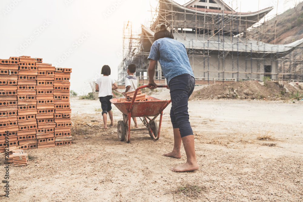 Children working at construction site for world day against child labour concept: Children working at construction site for world day against child labour concept: