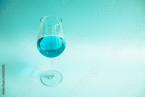 Glass of natural blue wine photo