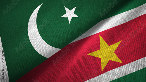 Pakistan and Suriname two flags textile cloth, fabric texture