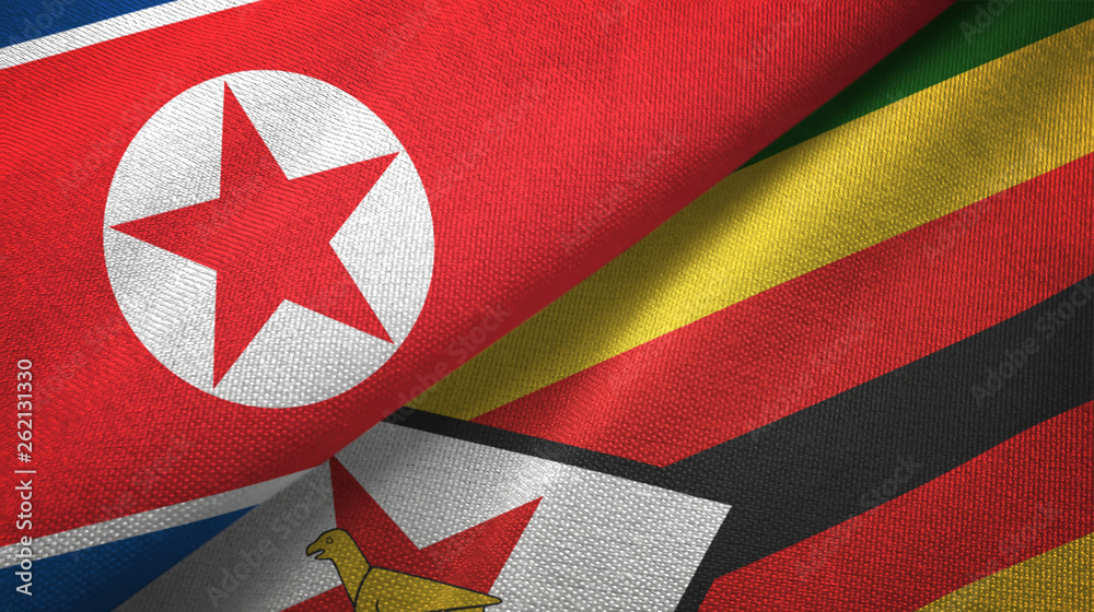Fototapeta premium North Korea and Zimbabwe two flags textile cloth, fabric texture