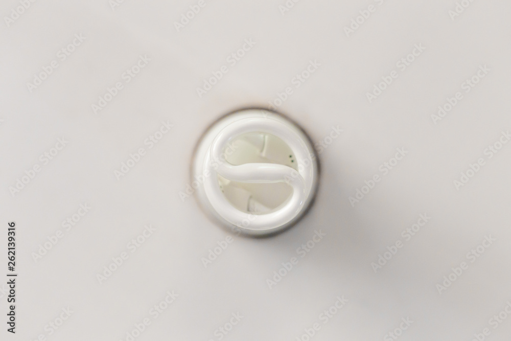 Light bulb on white ceiling Light bulb on white ceiling