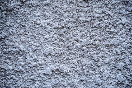 Closeup rough grey concrete wall for background, wallpaper