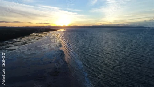 Aerial Video of a beautiful Sunset in Walakiri beach, Sumba Island. photo