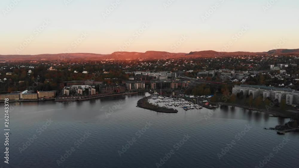 Lysaker dock in Oslo on a beautiful morning during sunrise.Drone moving closer. Part 1 of 2 Lysaker dock in Oslo on a beautiful morning during sunrise.Drone moving closer. Part 1 of 2