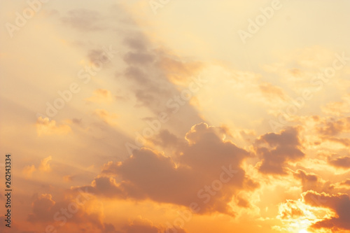Golden sky in the morning with sunlight under the clouds for nature concept
