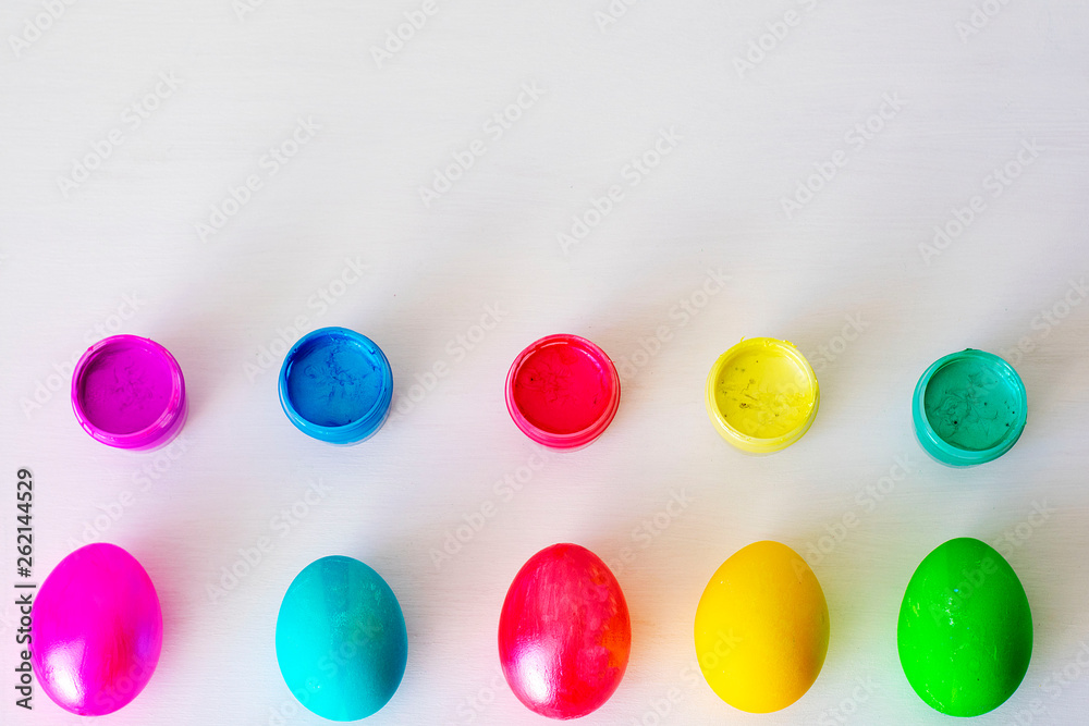 Easter eggs multicolored isolated on white background. Minimal easter concept. Happy easter card with copy space for text. Top view, flat.