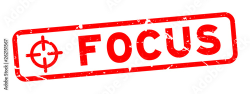 Grunge red focus word with scope icon square rubber seal stamp on white background