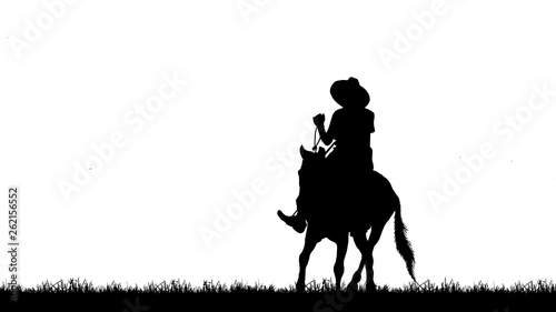 silhouette cowboy riding horse on white background © rathchapon