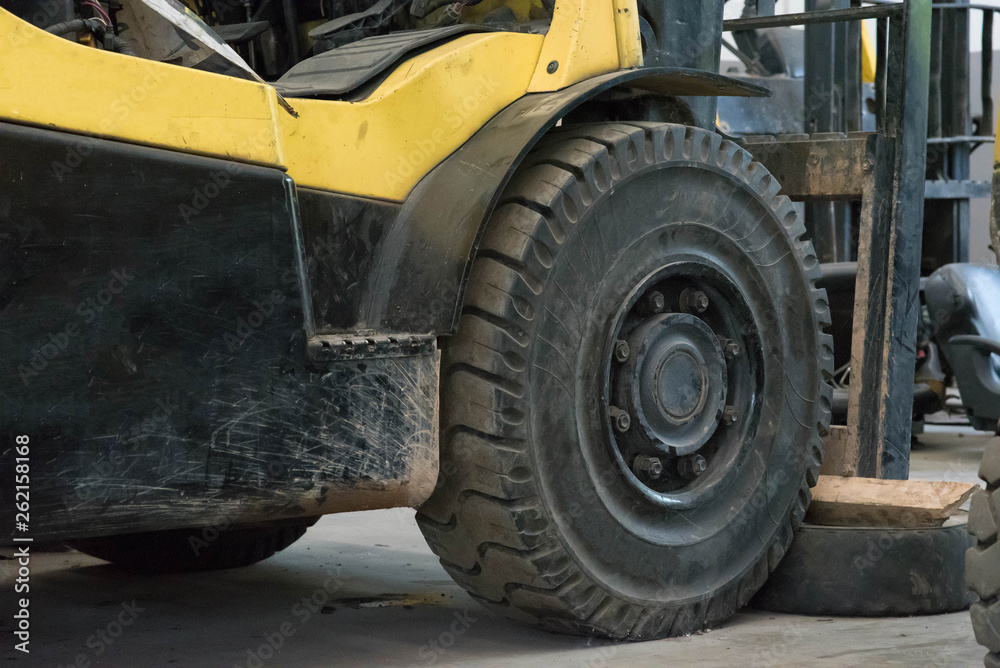 The front wheels of the forklift