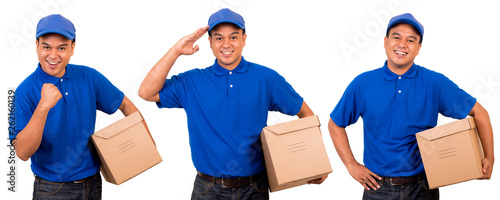 Young asian delivery man in blue uniform with parcel cardboard box on isolated