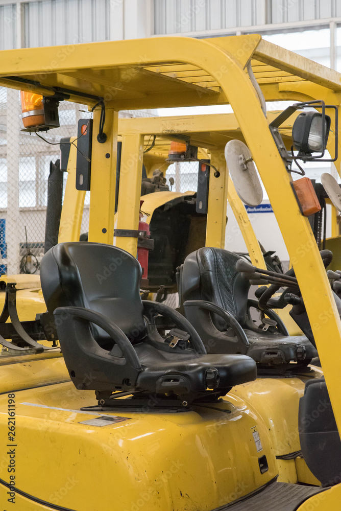 Forklifts in warehouse Forklifts in warehouse