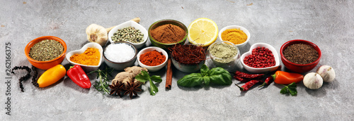 Spices and herbs on table. ...