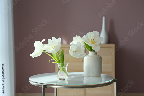 Wallpaper Mural Beautiful flowers on glass table in room Torontodigital.ca
