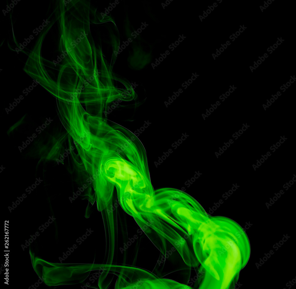 Fototapeta premium Green smoke on black background