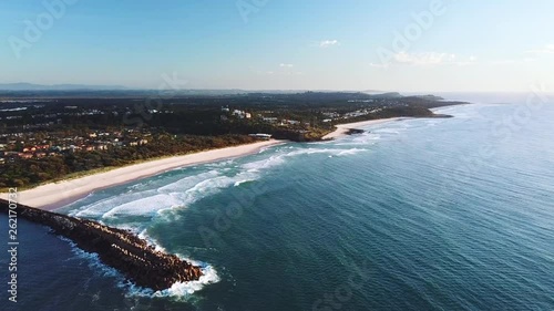 Drone flying forward showing Lighthouse beach, Shelly Beach and coastline. Ballina, Australia. photo