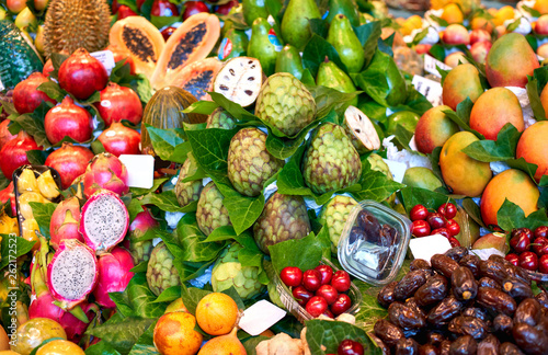 Fototapeta Naklejka Na Ścianę i Meble -  Fresh fruits in the market. Exotic fresh fruits on a market.Blueberry, papaya, dragon fruit, kiwi, passion fruit.