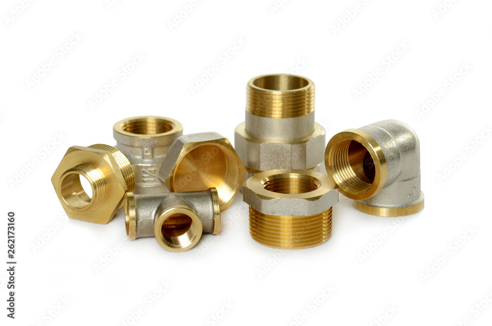 Set of metal-plastic plumbing couplings, adapters, plugs isolated on white background Set of metal-plastic plumbing couplings, adapters, plugs isolated on white background