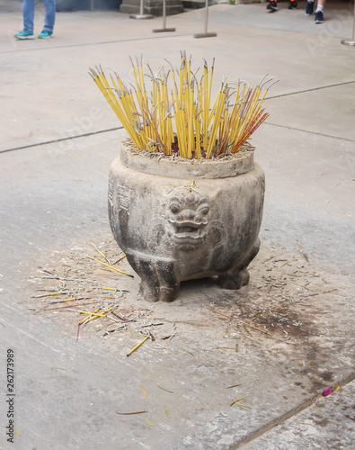 Close up of incense burner at Nong Ping village photo