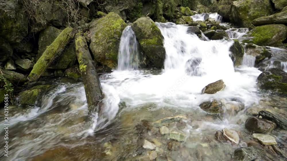 water stream in himalayas, waterfall in India water stream in himalayas, waterfall in India