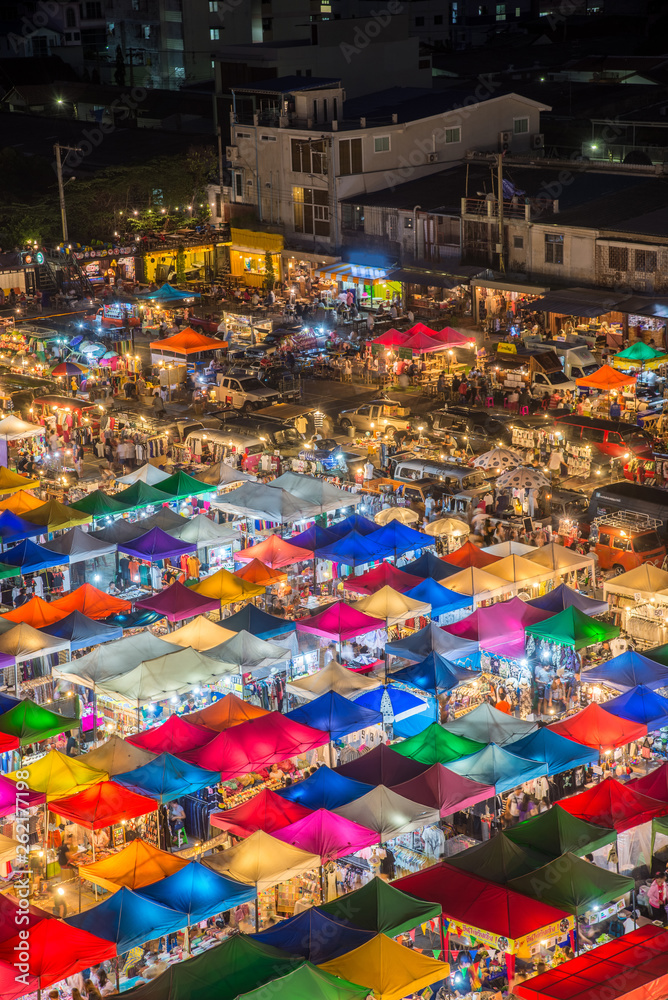 photo of night market high view from building colorful tent retail shop and lighting