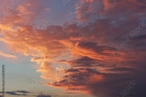 Beautiful blue sky with clouds of various shapes and colors. © sangri