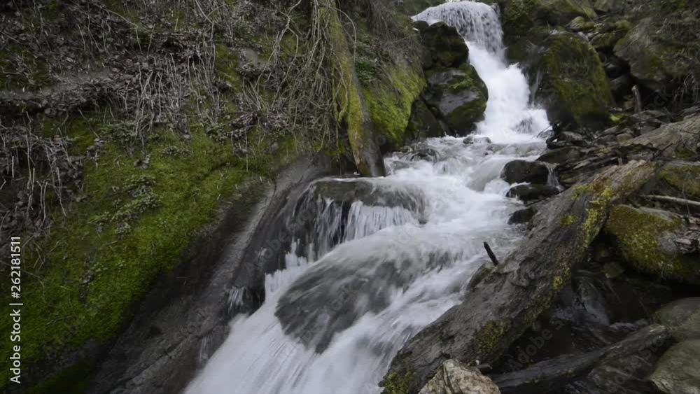 water stream in himalayas, waterfall in India water stream in himalayas, waterfall in India