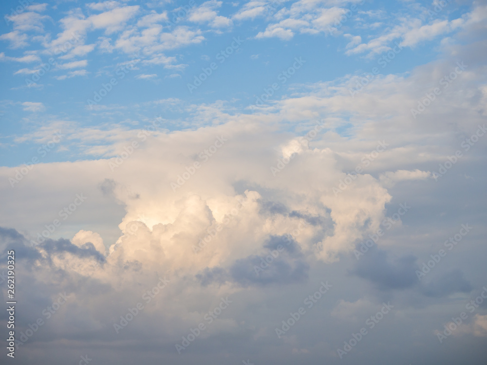Beautiful, cumulus clouds in the blue sky Beautiful, cumulus clouds in the blue sky