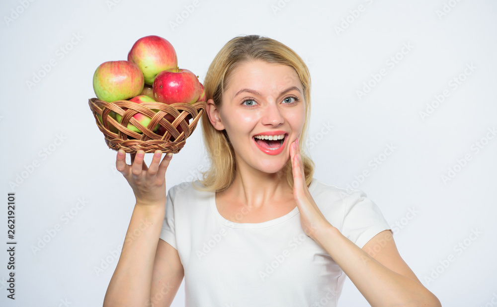Rich harvest. vitamin diet and food shooping. farming concept. healthy teeth. orchard, gardener girl with apple basket. Happy woman eating apple. autumn harvest. Spring seasonal fruit Rich harvest. vitamin diet and food shooping. farming concept. healthy teeth. orchard, gardener girl with apple basket. Happy woman eating apple. autumn harvest. Spring seasonal fruit