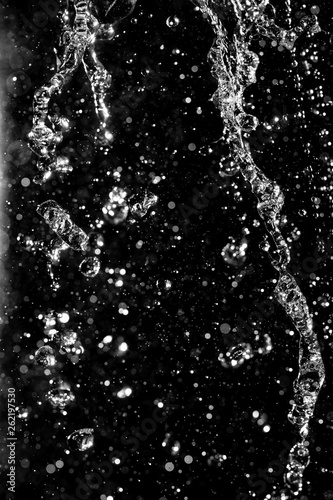 water jet with splashes on a black background