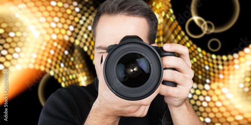 Male Photographer with Camera on background
