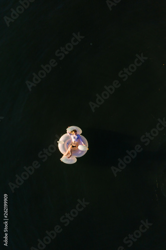 woman floating in ocean