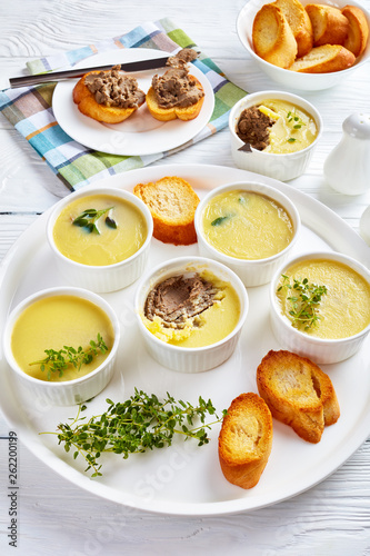 chicken liver pate with butter in ramekins