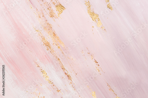 Delicate pink marble background with gold brushstrokes. Place for your design