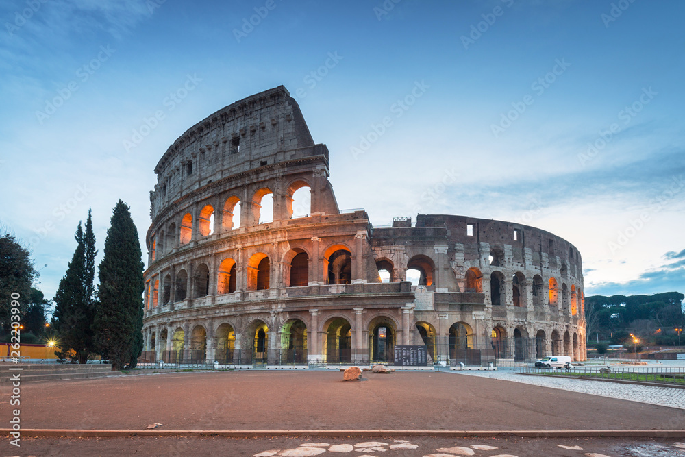 The Colosseum in Rome illuminated at dawn, Italy