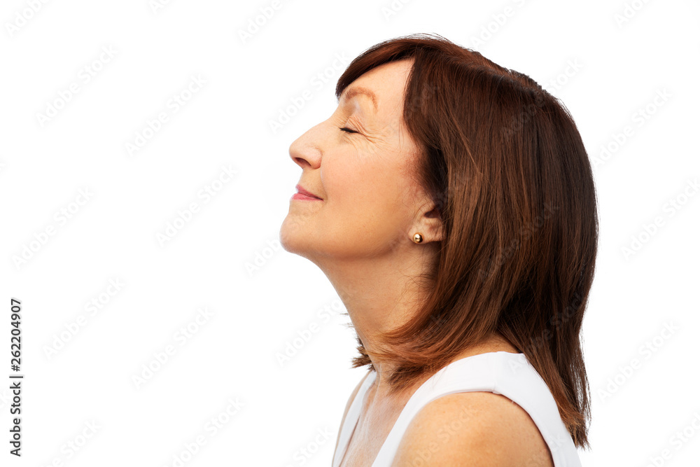 beauty, rhinoplasty and old people concept - profile of smiling senior woman over white background beauty, rhinoplasty and old people concept - profile of smiling senior woman over white background