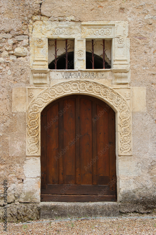 door of a medieval mansion in couture-sur-loir (france)
