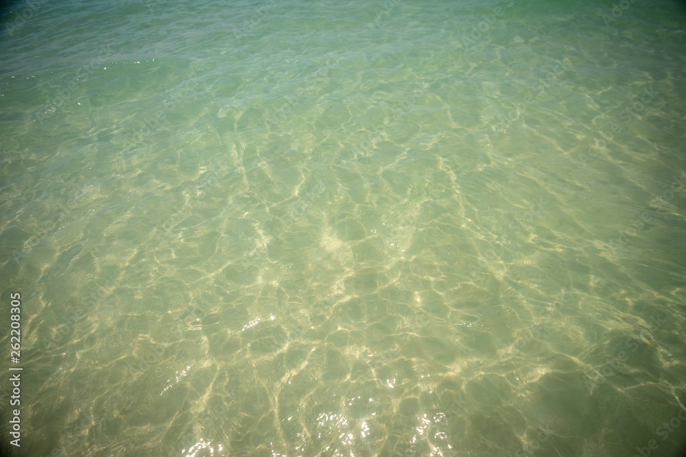 Small waves lapped the beach Small waves lapped the beach