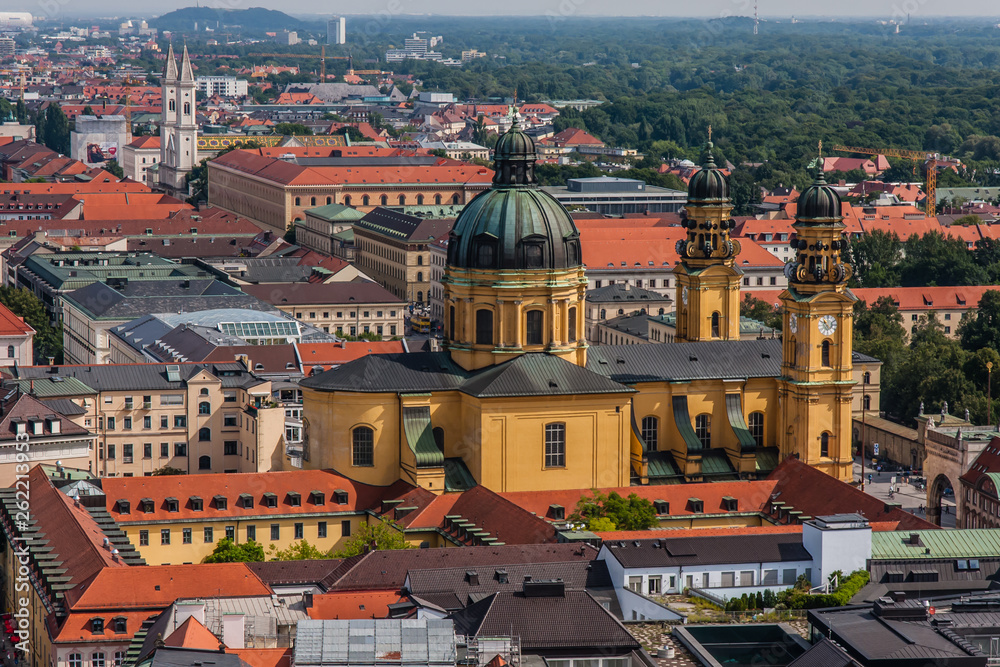 Obraz premium Cityscape of Munich with Theatine Church, a view from Frauenkirche