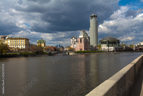 Embankment of the Moskva River against the cloudy sky
