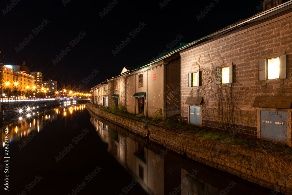 Landscape view of Otaru canals and warehouse at night in Hokkaido Japan.