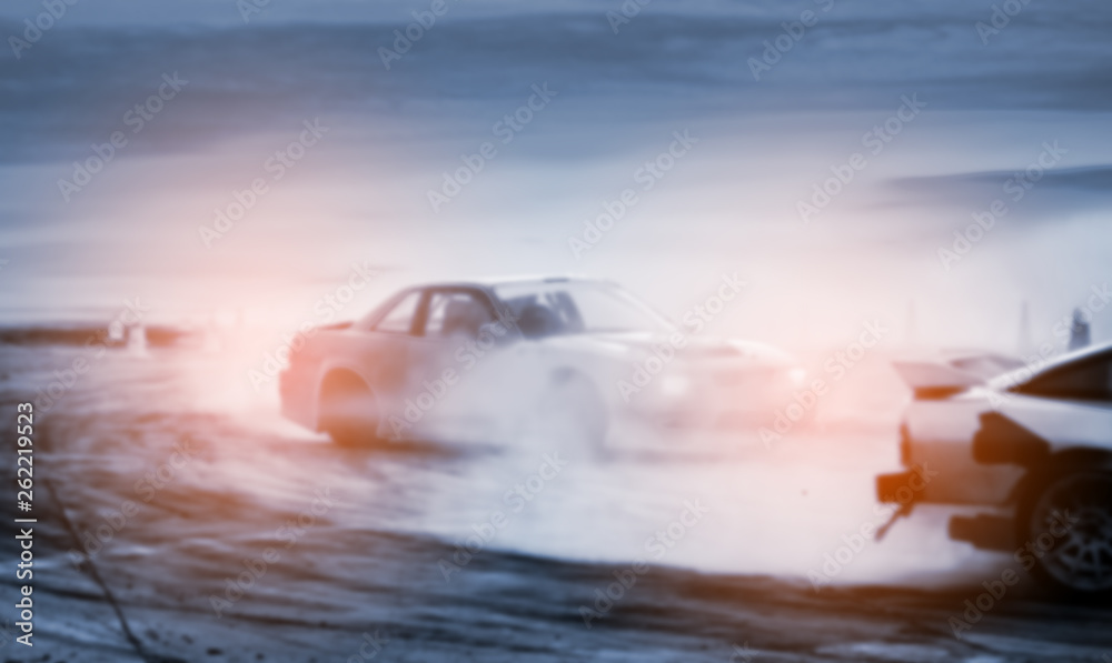 Abstract blurred old car drifting, Sport car wheel drifting and smoking on blurred background. Motorsport concept.