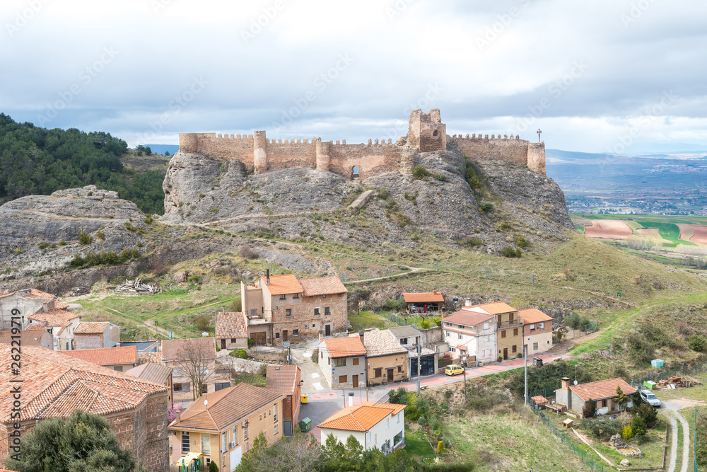 medieval townwith old castle at hill, Spain