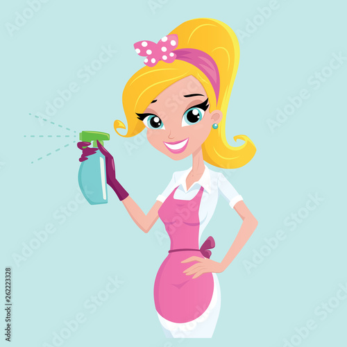 Housewife holding spray bottle