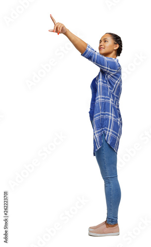 Side view of a black African-American woman in a shirt pointing