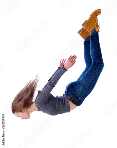 Obraz na płótnie Side view of woman in zero gravity or a fall.