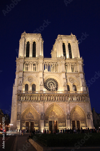 Famous Notre Dame at night in Paris, France.