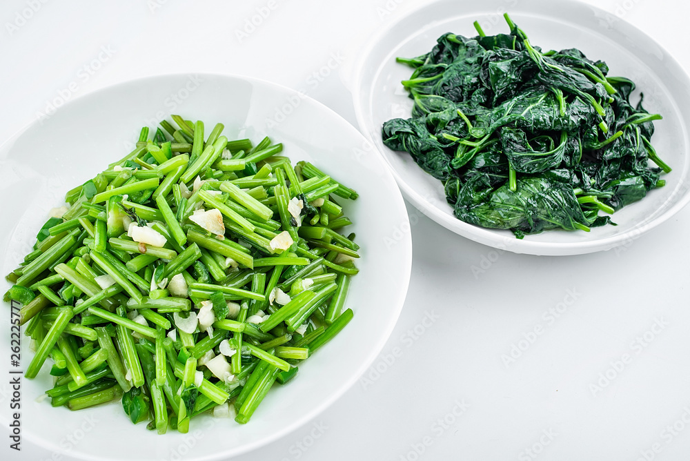 Chinese vegetables, fried sweet potato leaves and fried sweet potato stalks Chinese vegetables, fried sweet potato leaves and fried sweet potato stalks